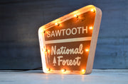 NATIONAL FOREST LIGHTED SIGN